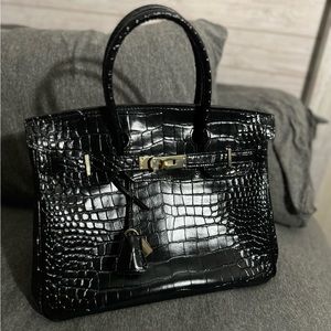 Crocodile designer handbag